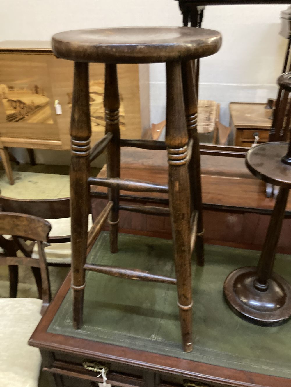 An Edwardian folding cake stand, a beech bar stool and a smokers stand